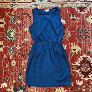 Navy blue dress with pockets and open back